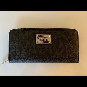 Michael Kors jet set tote and matching wallet.